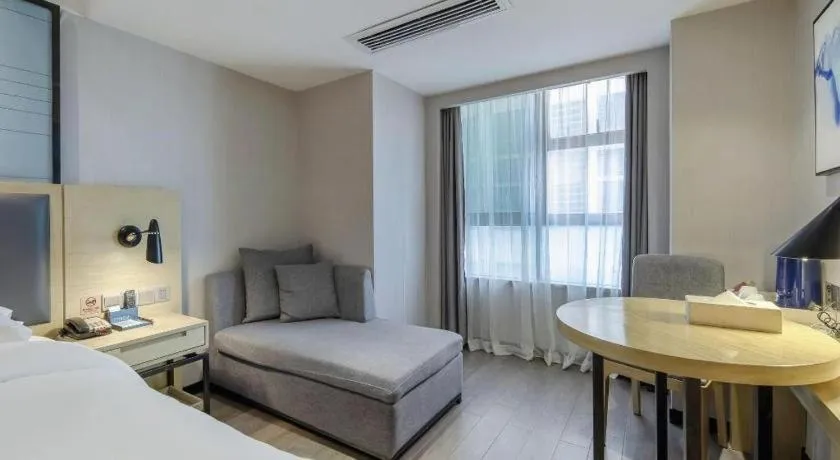 Bed in Echarm Hotel Beihai Railway Station