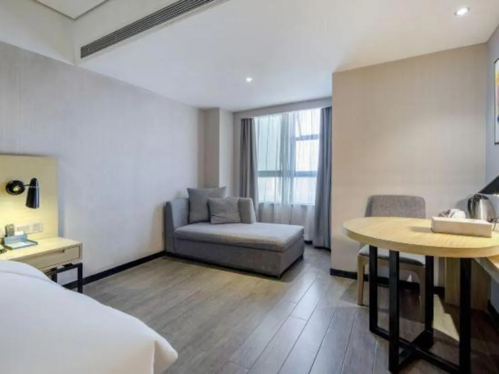 Bed in Echarm Hotel Beihai Railway Station