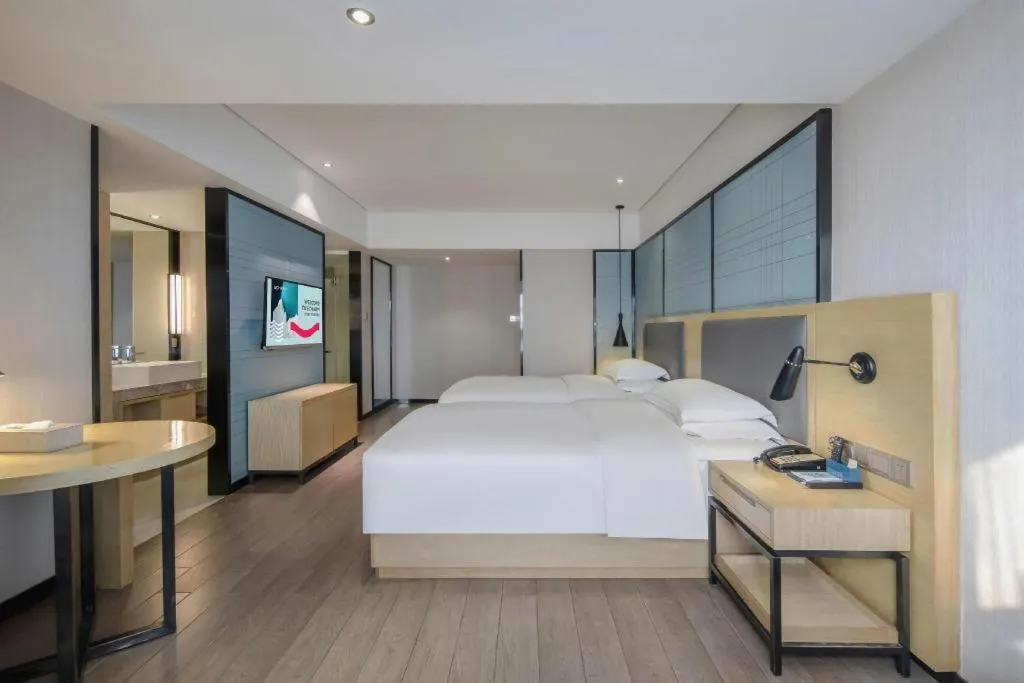 Bed in Echarm Hotel Beihai Railway Station