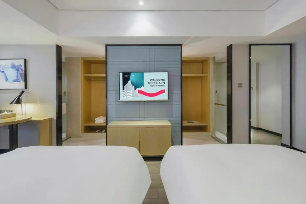 Bed in Echarm Hotel Beihai Railway Station