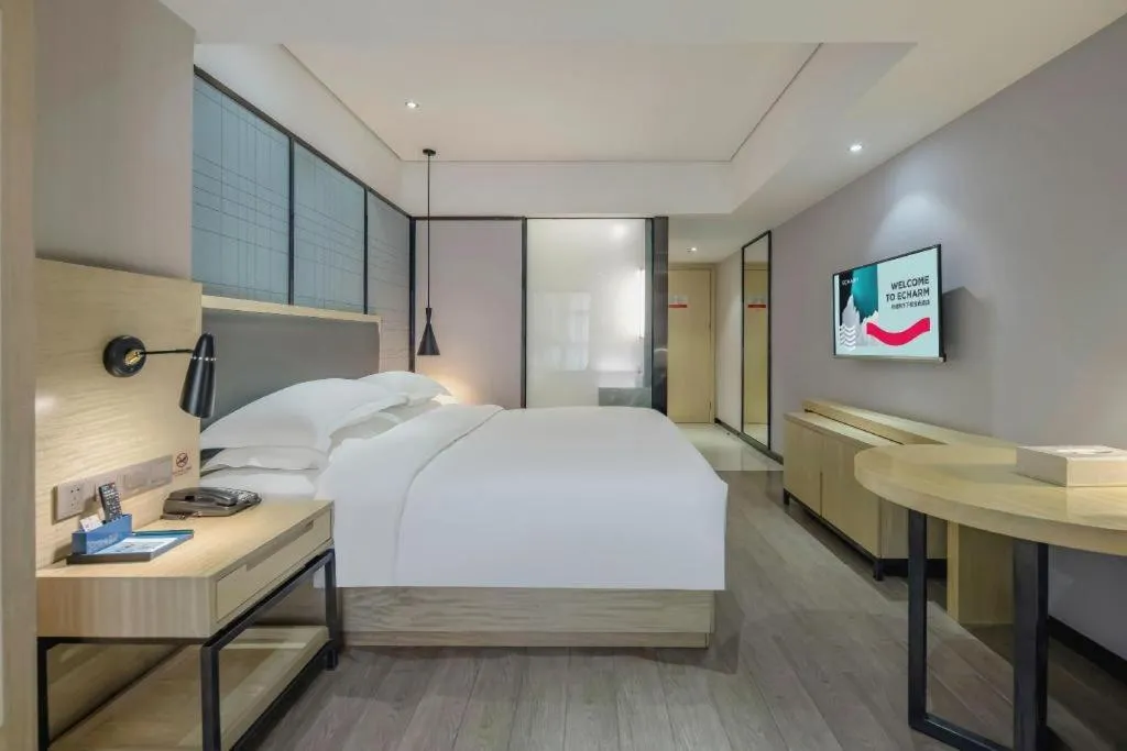 Bed in Echarm Hotel Beihai Railway Station