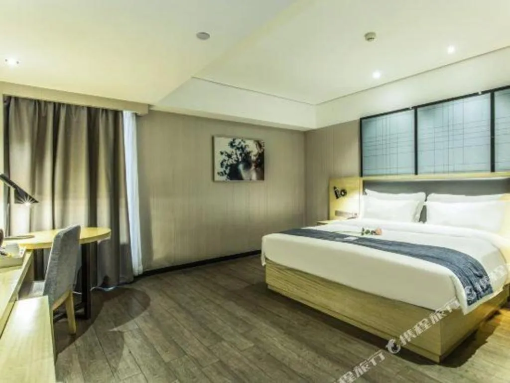 Bed in Echarm Hotel Beihai Railway Station