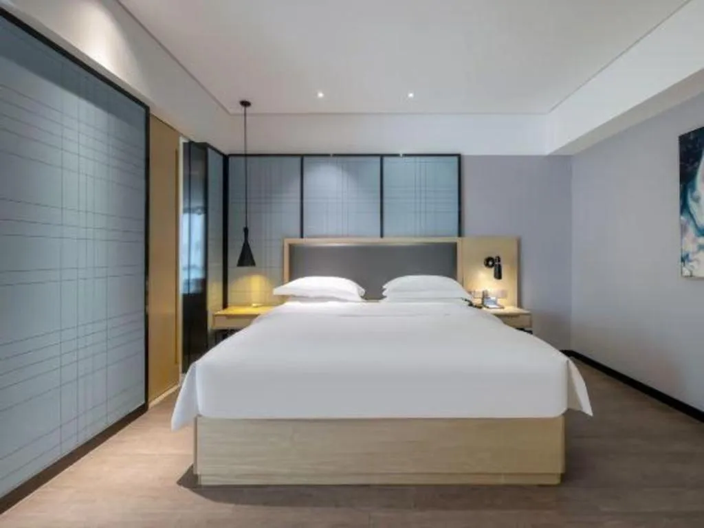 Bed in Echarm Hotel Beihai Railway Station