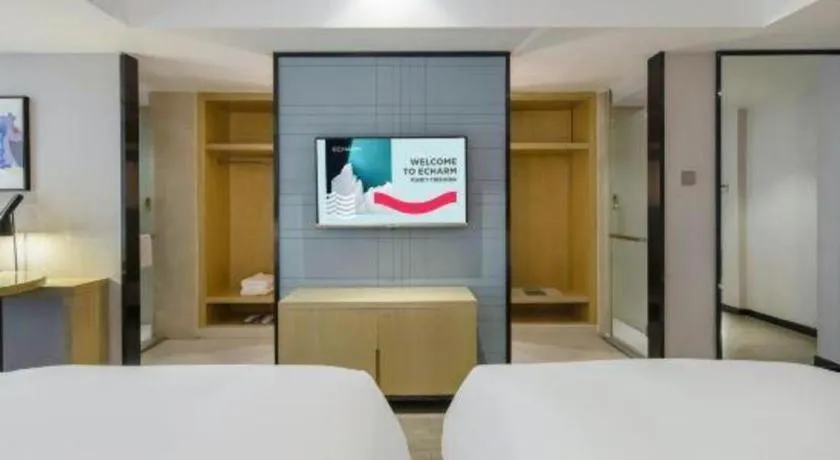 Bed in Echarm Hotel Beihai Railway Station