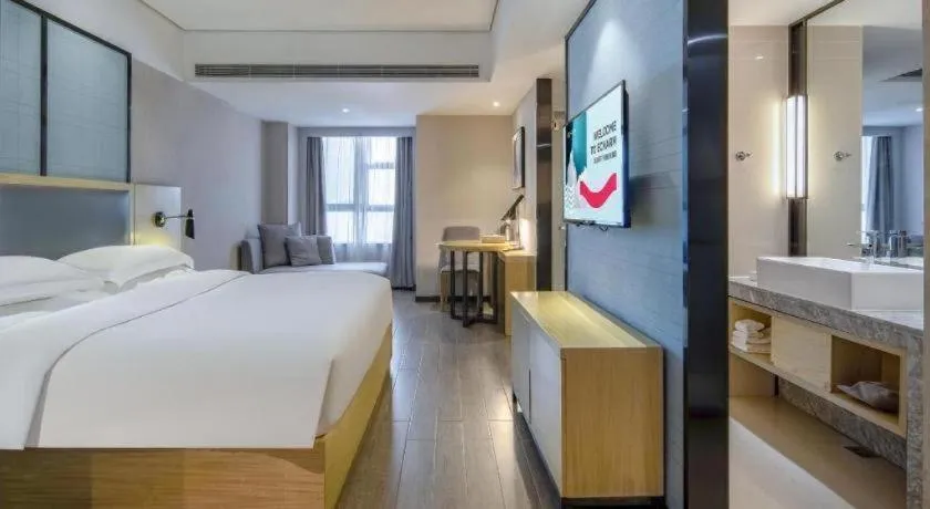 Bed in Echarm Hotel Beihai Railway Station