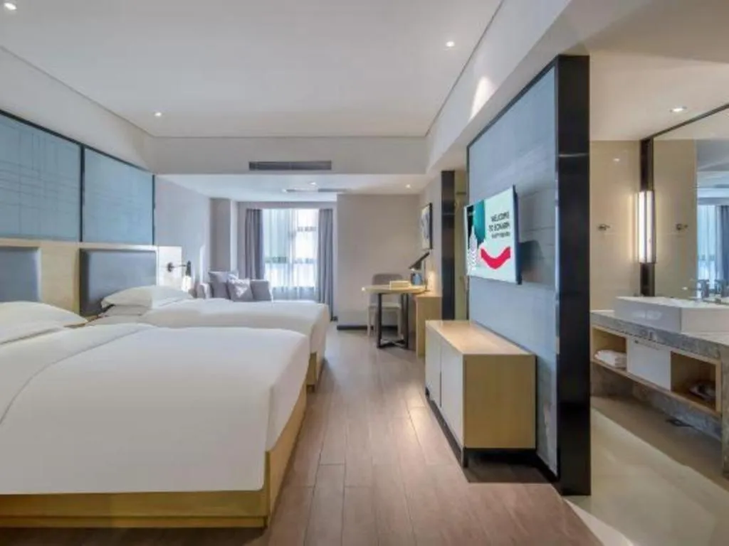 Bed in Echarm Hotel Beihai Railway Station