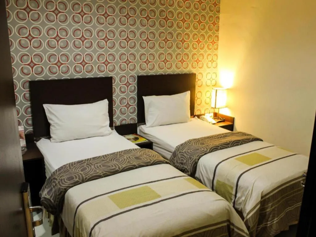 Bed in Vindhika Hotel