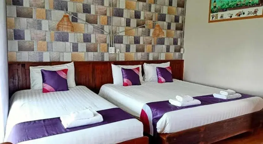 Bed in 111 Resort and Spa Bed in 111 Resort and Spa