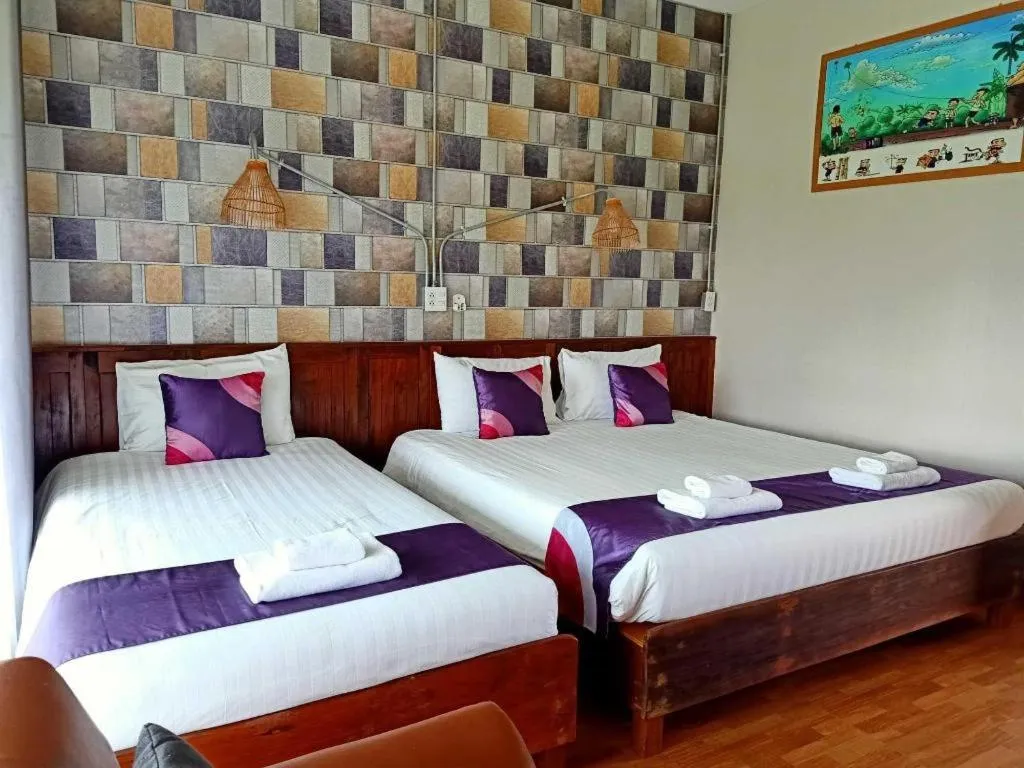 Bed in 111 Resort and Spa