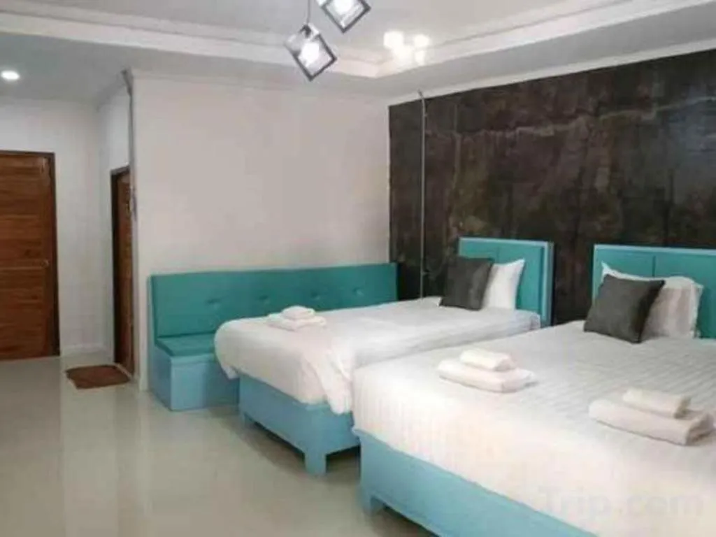 Bed in 111 Resort and Spa