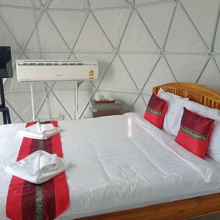 Bed in 111 Resort and Spa