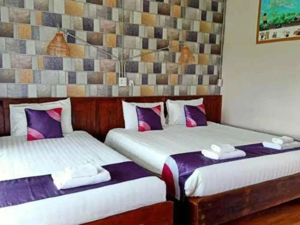 Bed in 111 Resort and Spa