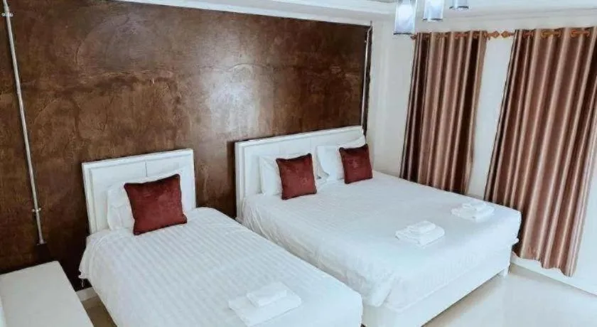 Bed in 111 Resort and Spa