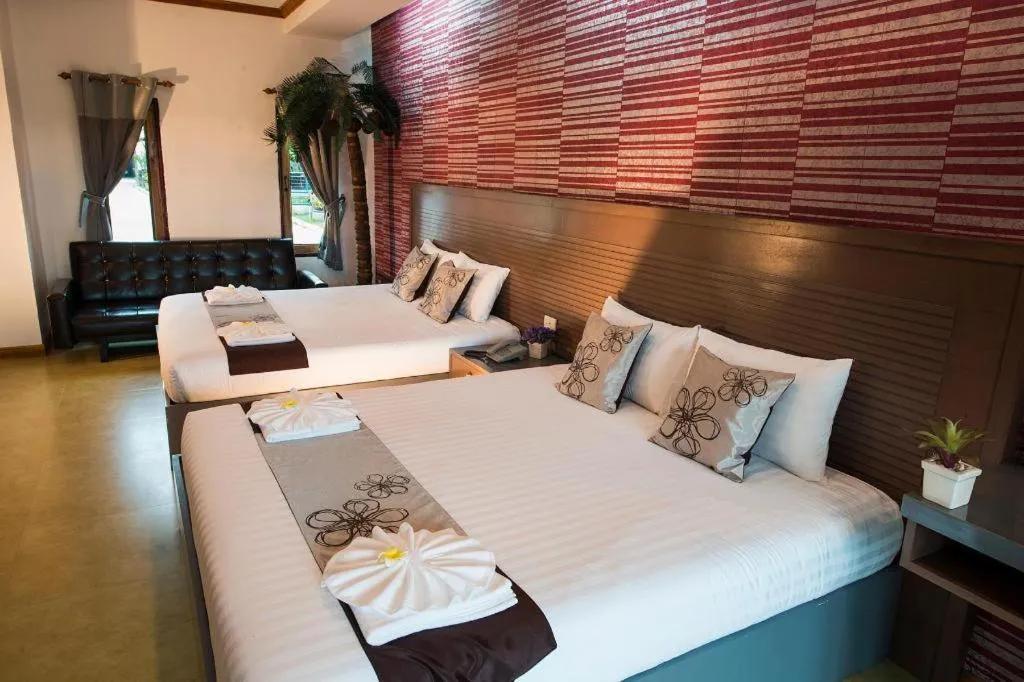 Bed in 111 Resort and Spa