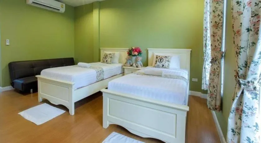 Bed in Varee Valley Resort and Restaurant