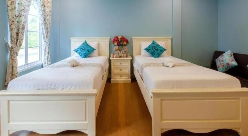 Bed in Varee Valley Resort and Restaurant