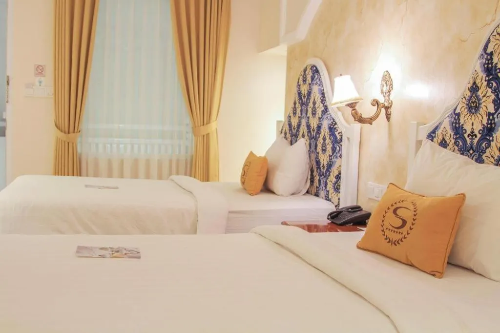 Bed in Sahira Hotel Pakuan