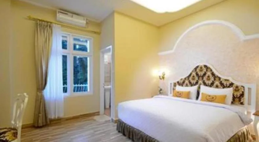 Bed in Sahira Hotel Pakuan