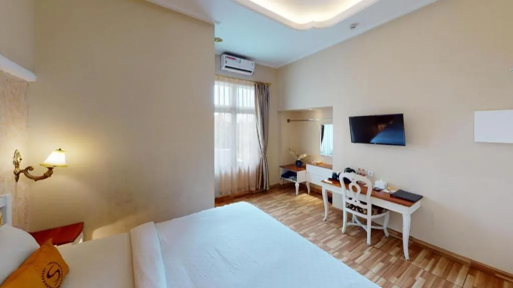 Bed in Sahira Hotel Pakuan