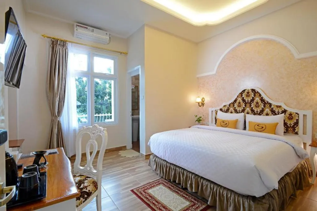 Bed in Sahira Hotel Pakuan