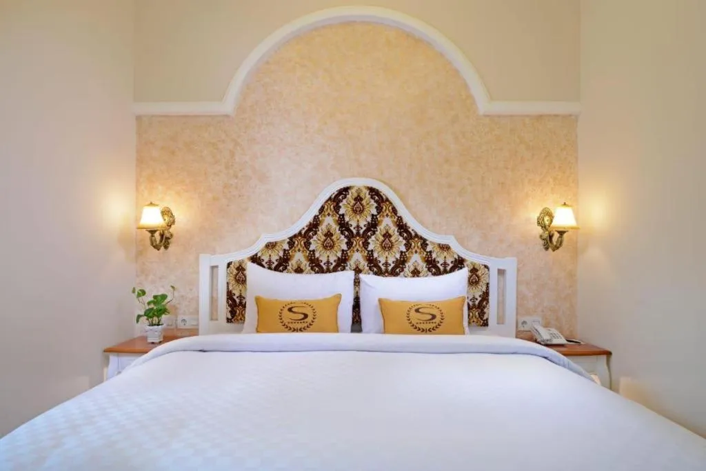 Bed in Sahira Hotel Pakuan