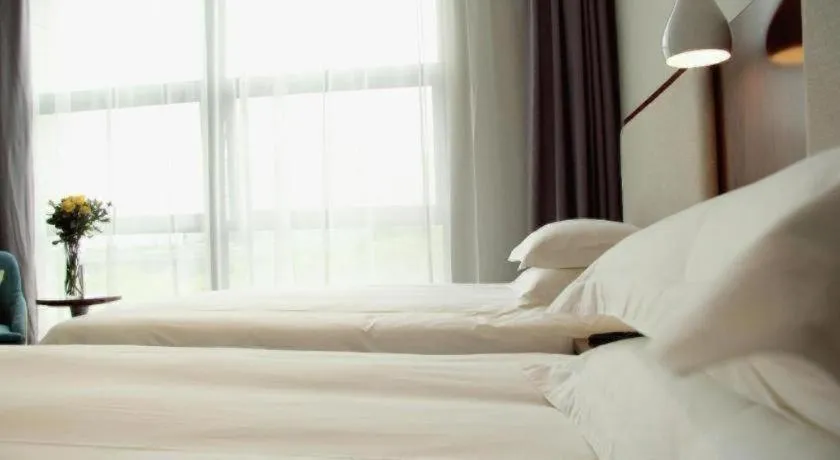 Bed in Hangzhou Berman Hotel