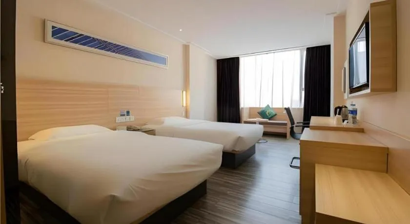 Bed in City Comfort Inn Changsha Tangshuili Fuyou