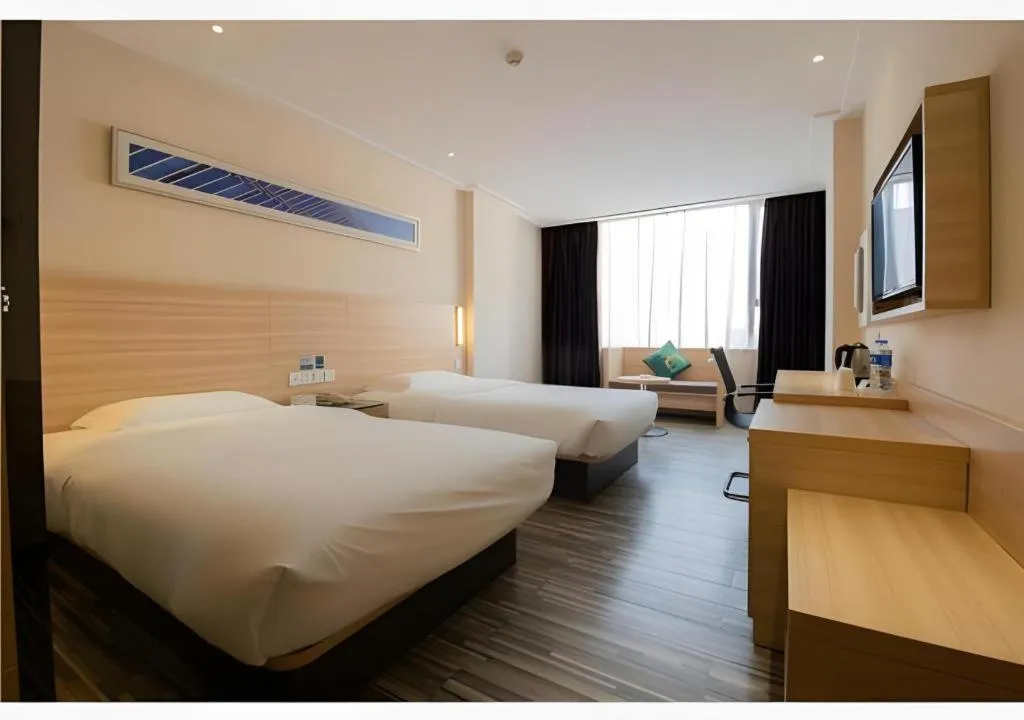 Bed in City Comfort Inn Changsha Tangshuili Fuyou