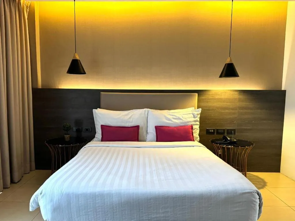 Bed in Home Crest Hotel