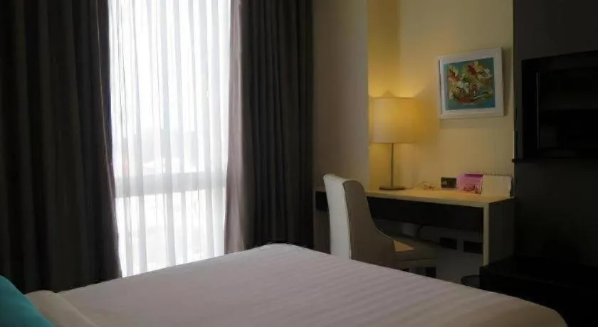 Bed in Home Crest Hotel