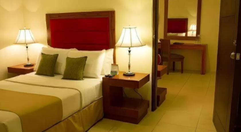 Bed in Home Crest Hotel