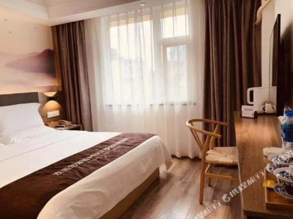 Bed in Anyi 158 Hotel Fuqin