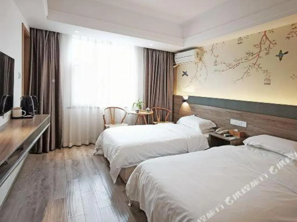 Bed in Anyi 158 Hotel Fuqin