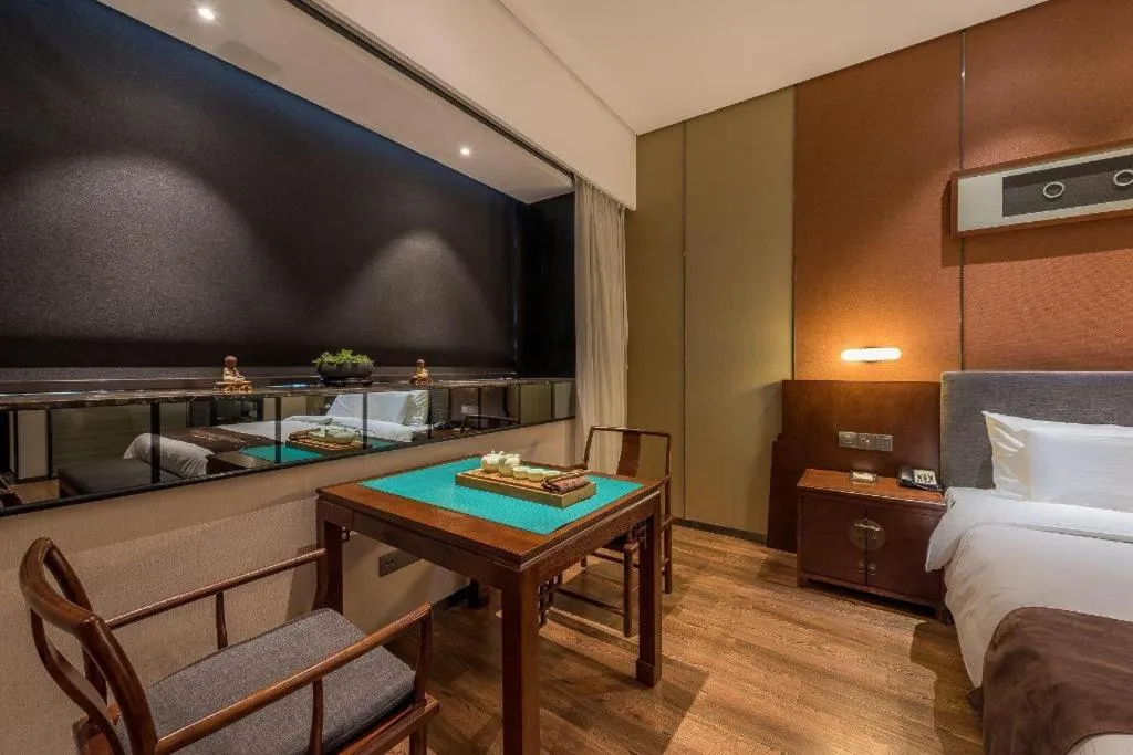 Bed in Rezen Hotel Pasonda Junyu