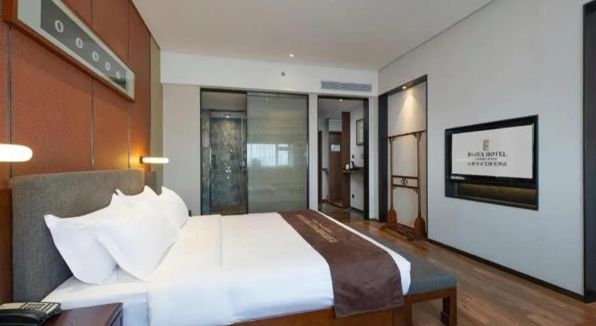 Bed in Rezen Hotel Pasonda Junyu