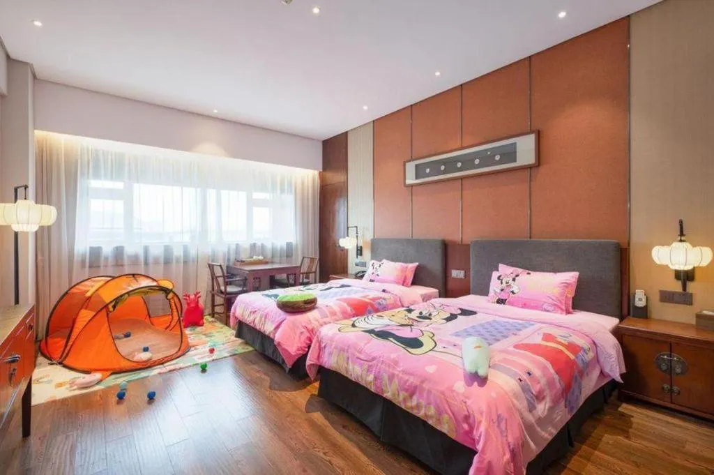 Bed in Rezen Hotel Pasonda Junyu