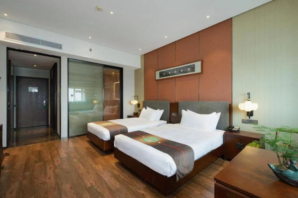 Bed in Rezen Hotel Pasonda Junyu