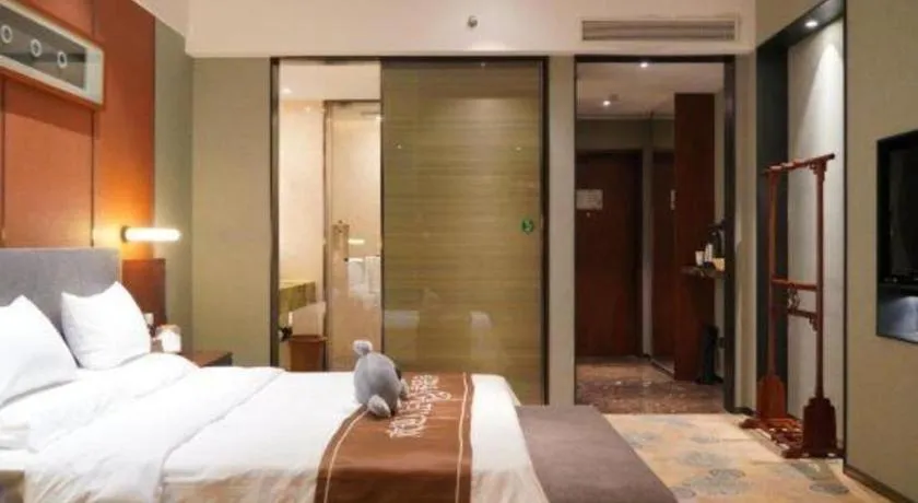 Bed in Rezen Hotel Pasonda Junyu