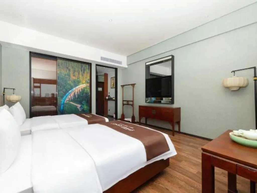 Bed in Rezen Hotel Pasonda Junyu