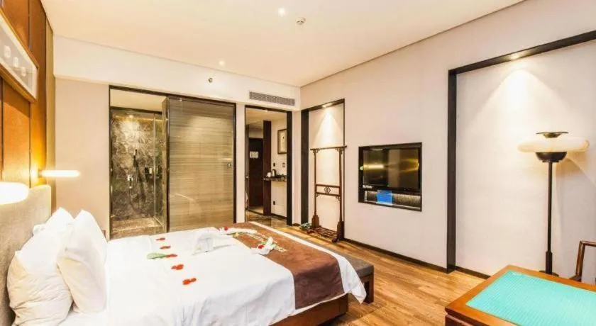 Bed in Rezen Hotel Pasonda Junyu