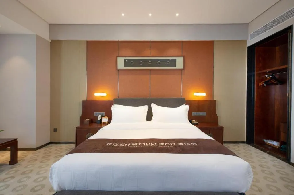 Bed in Rezen Hotel Pasonda Junyu