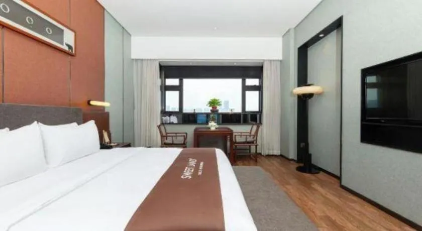 Bed in Rezen Hotel Pasonda Junyu