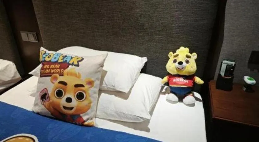 Bed in Rezen Hotel Pasonda Junyu