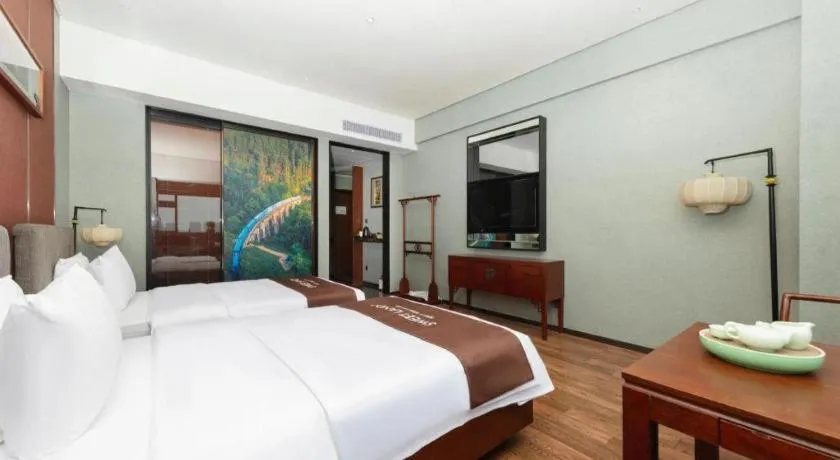 Bed in Rezen Hotel Pasonda Junyu