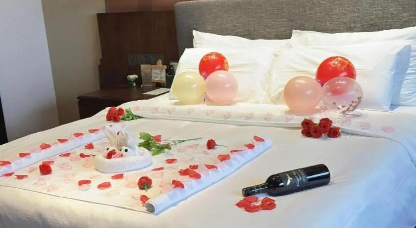 Bed in Rezen Hotel Pasonda Junyu