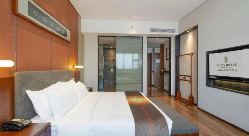 Bed in Rezen Hotel Pasonda Junyu