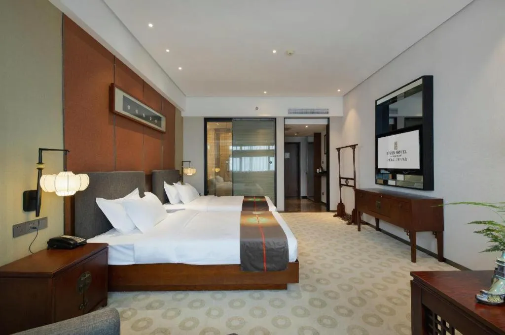 Bed in Rezen Hotel Pasonda Junyu