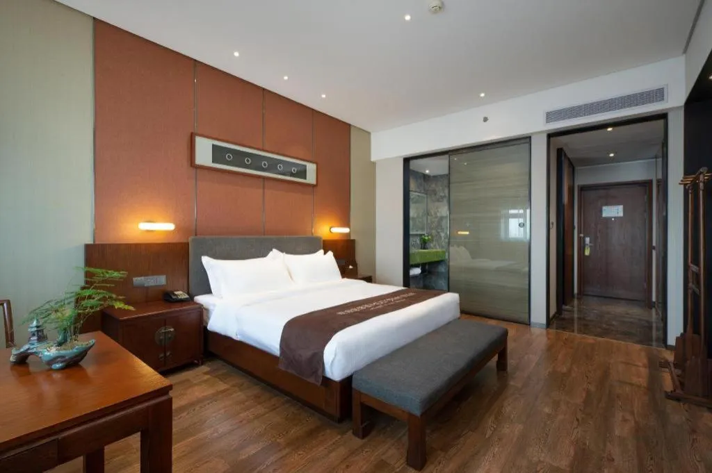 Bed in Rezen Hotel Pasonda Junyu