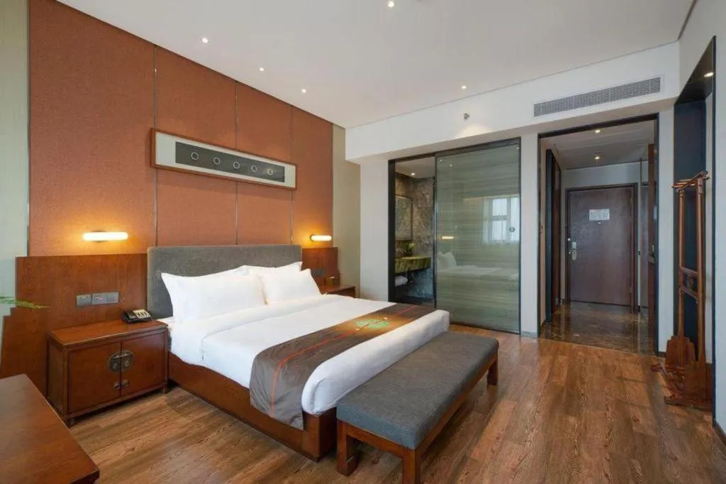 Bed in Rezen Hotel Pasonda Junyu