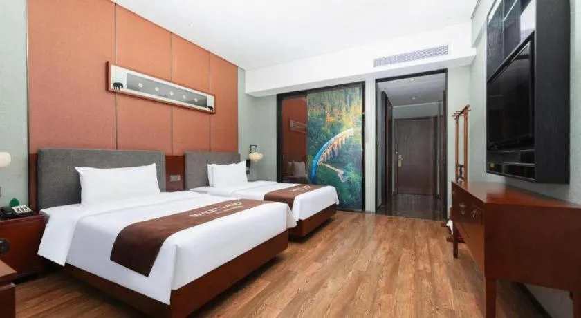 Bed in Rezen Hotel Pasonda Junyu